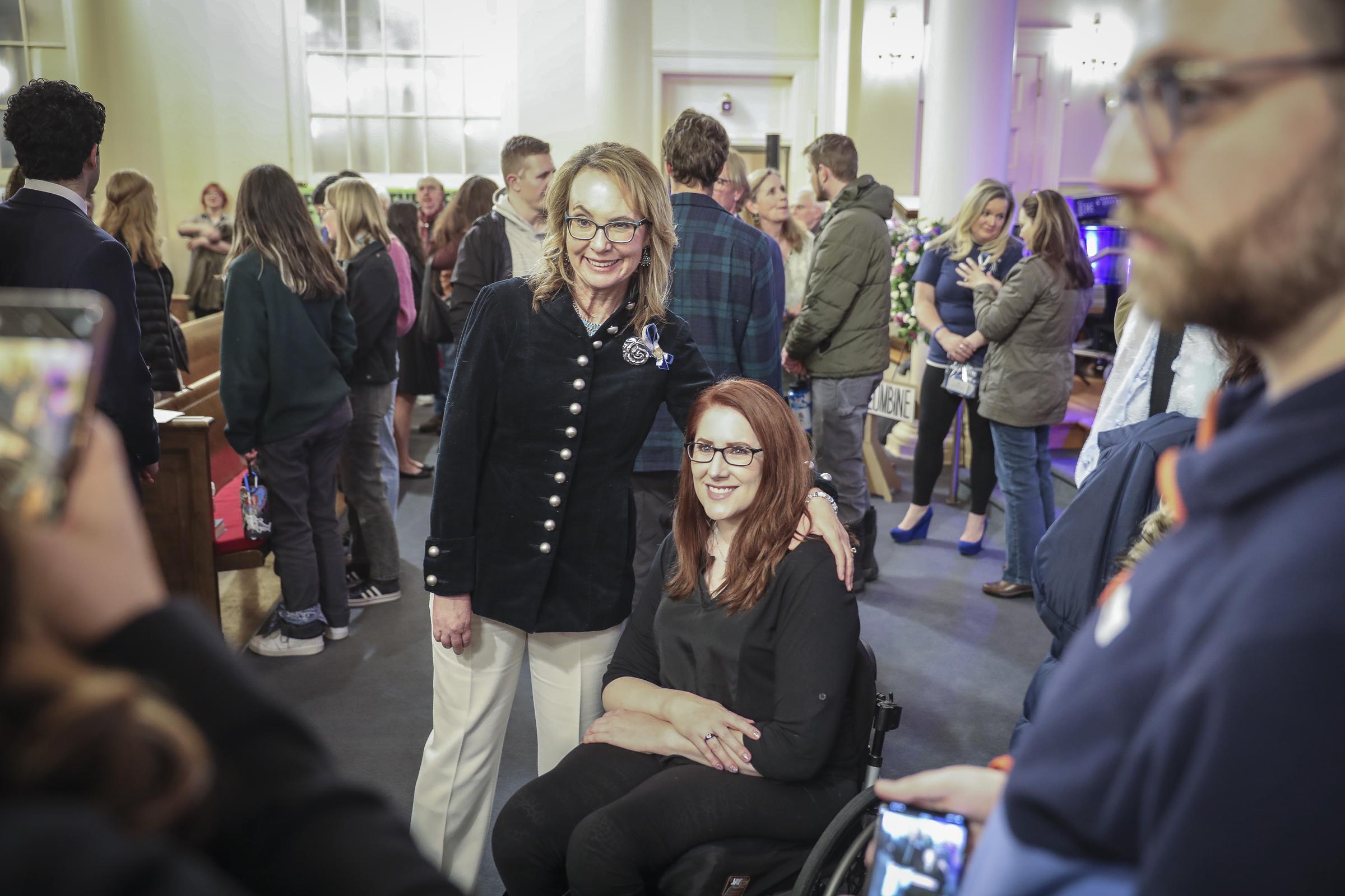 Anne Marie Hochhalter poses with former politician Gabrielle Giffords after the 25th Year Remembrance in Denver, on April 19, 2024 | Source: Getty Images