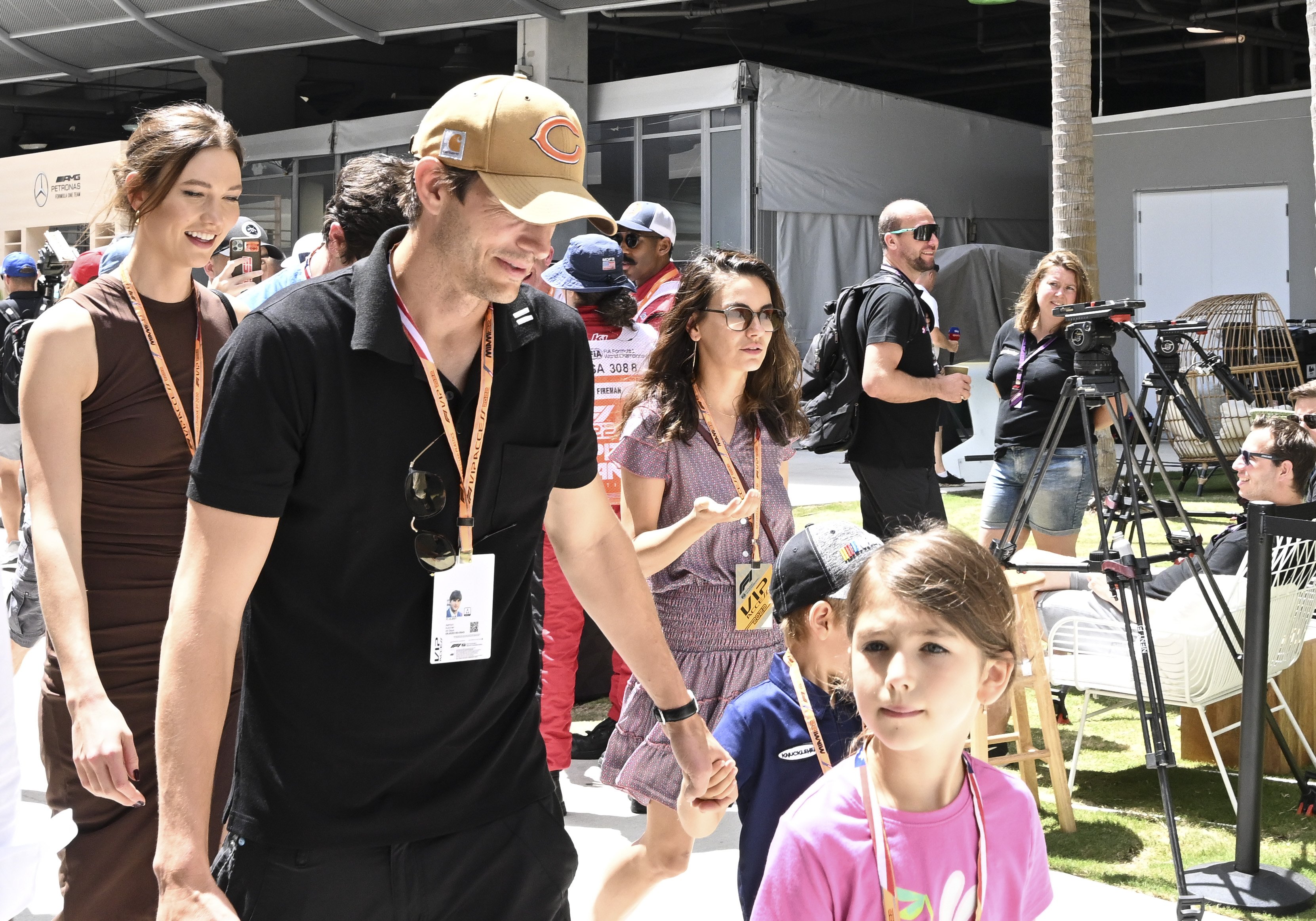 Ashton Kutcher with his children Wyatt and Dimitri in Miami in 2022 | Source: Getty Images