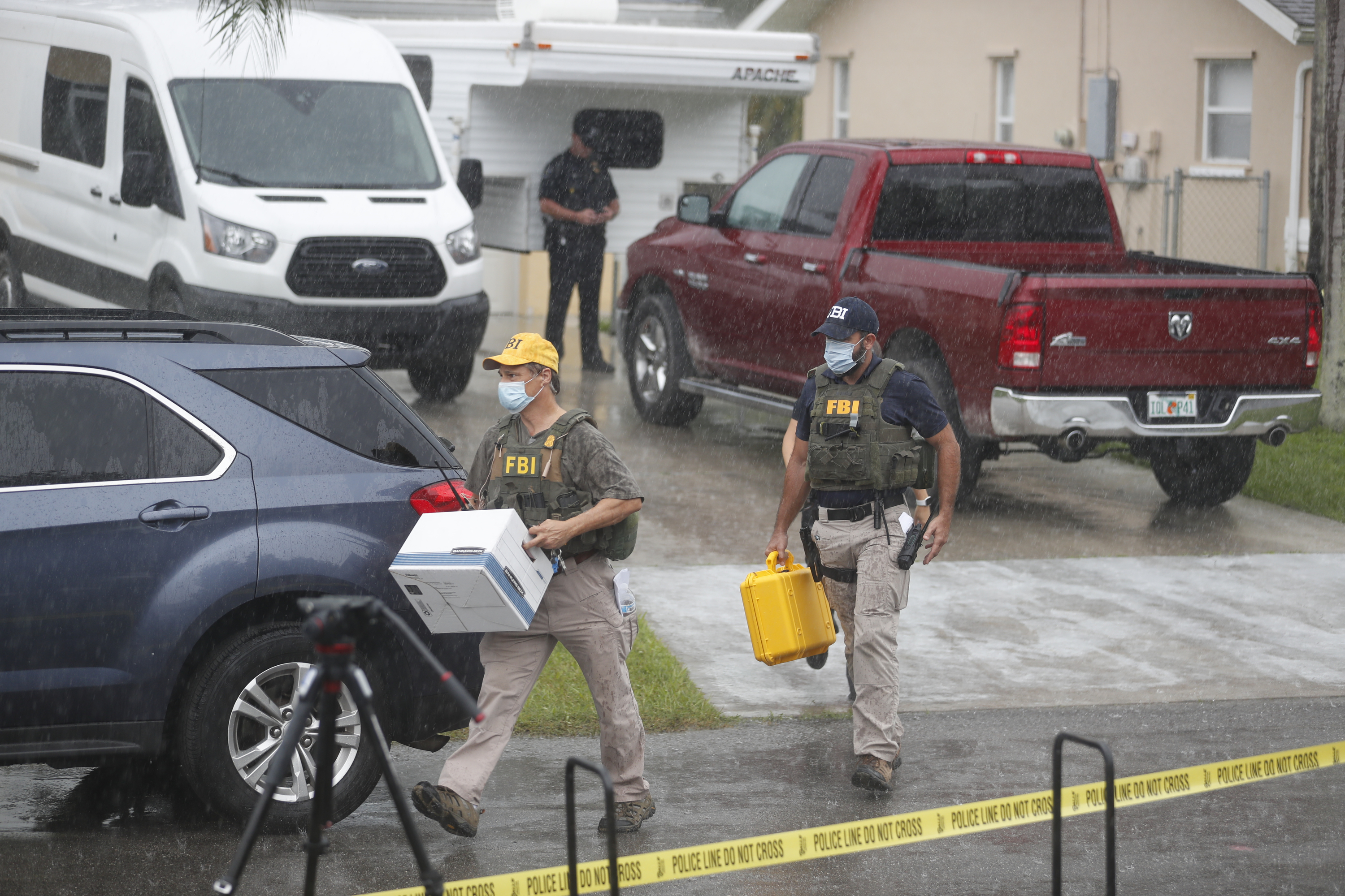 FBI agents taking away evidence from the family home of Brian Laundrie on September 20, 2021, in North Port, Florida. | Source: Getty Images