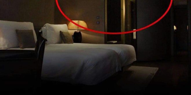 Why do you need to turn on the bathroom light when sleeping in a motel or hotel?