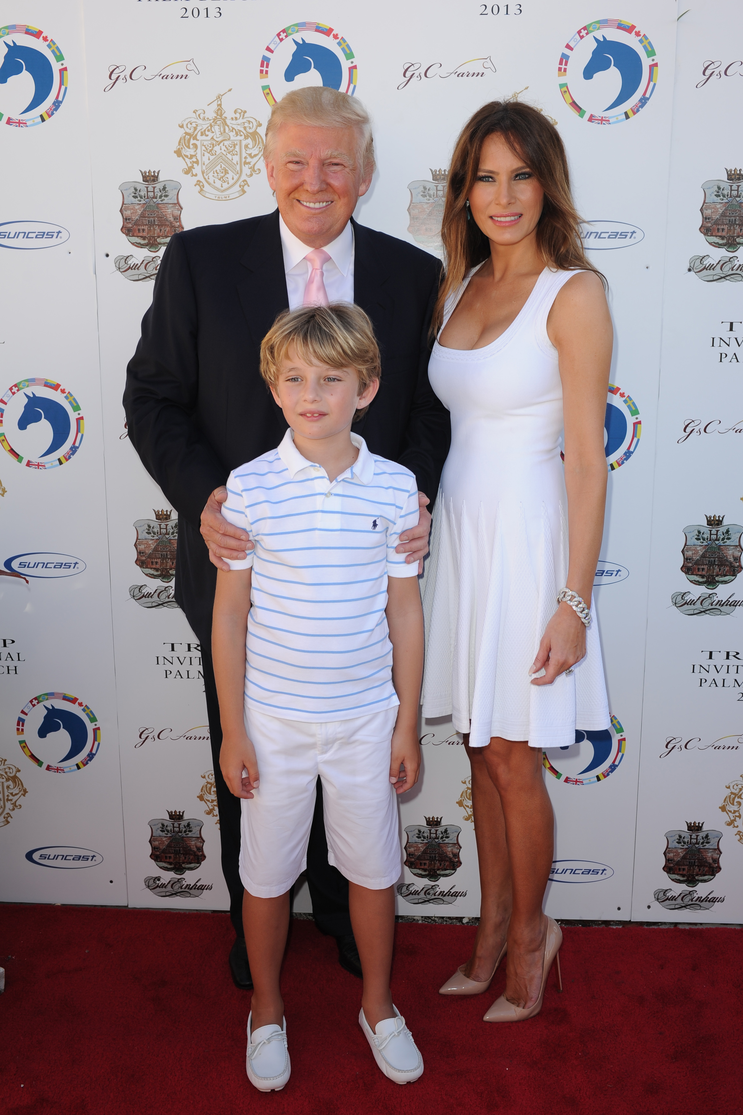 Donald, Melania, and Barron Trump at Trump Invitational Grand Prix on January 6, 2013, in Palm Beach, Florida. | Source: Getty Images