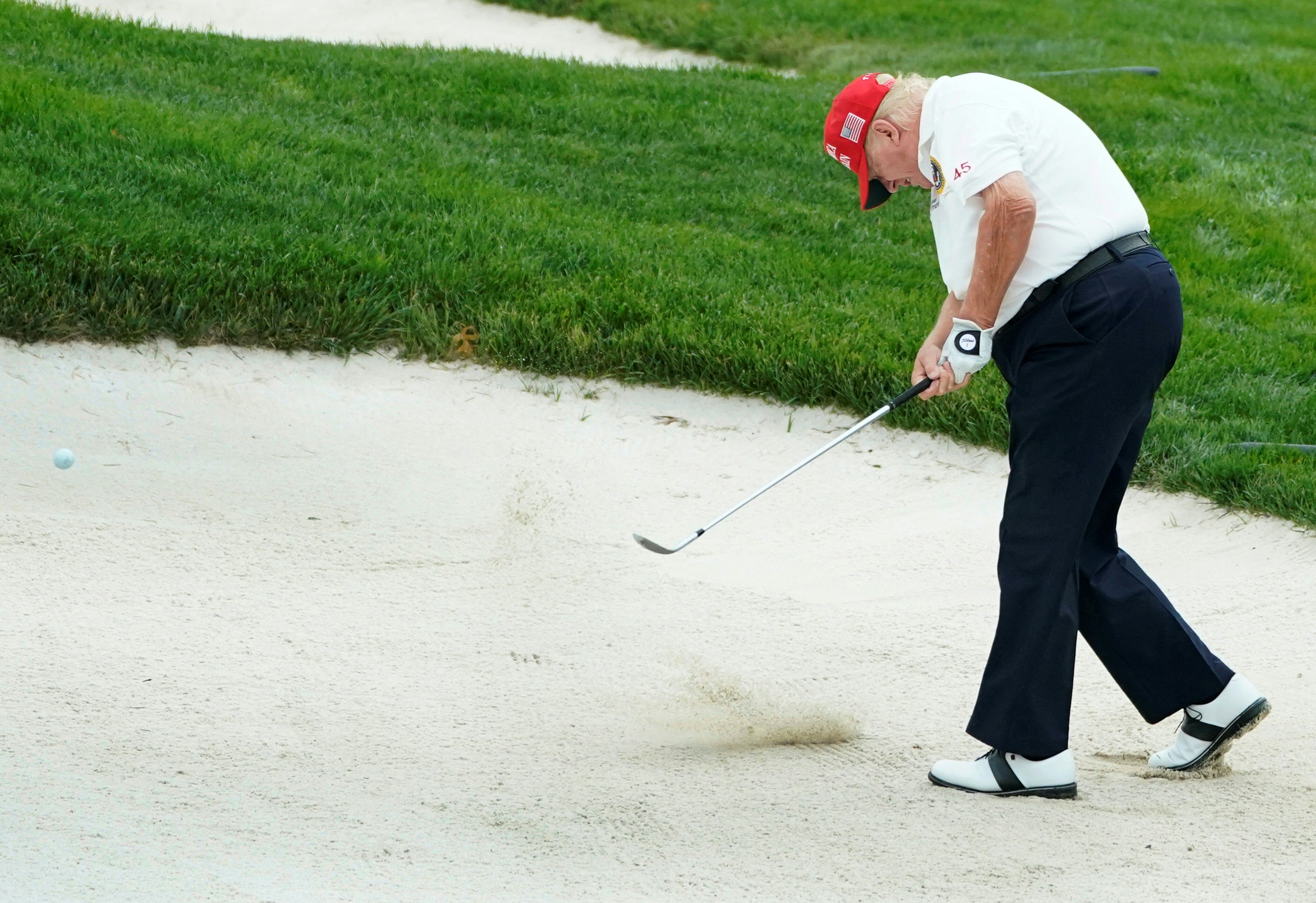 Donald Trump plays golf during the Official Pro-Am Tournament ahead of the LIV Golf Invitational Series event at Trump National Golf Club Bedminster in Bedminster, New Jersey, on August 10, 2023 | Source: Getty Images