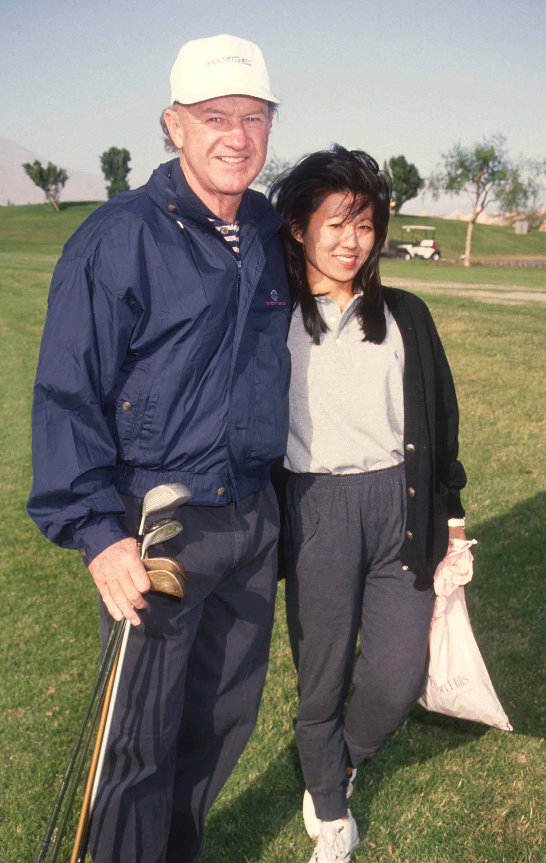 Gene Hackman and Betsy Arakawa at the Mission Hills Celebrity Sports Invitational in Rancho Mirage, California on November 30, 1991. | Source: Getty Images